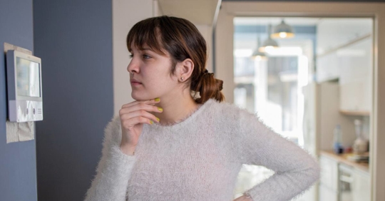 homeowner having trouble with their thermostat