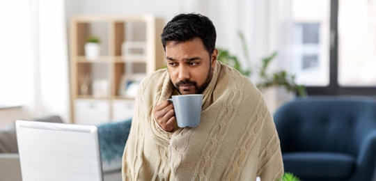 Drinking coffee with blanket