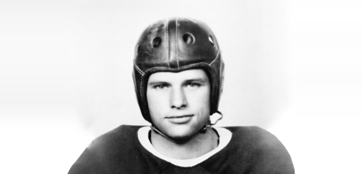 a Black and White headshot photo of Davey O'Brien in his Football Uniform