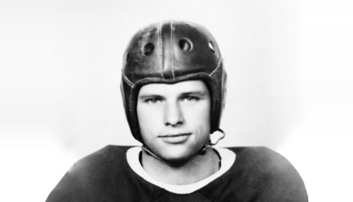 a Black and White headshot photo of Davey O'Brien in his Football Uniform