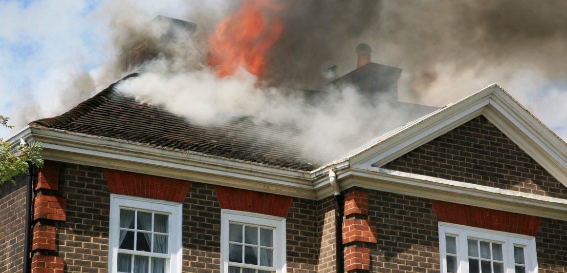 A house roof on fire